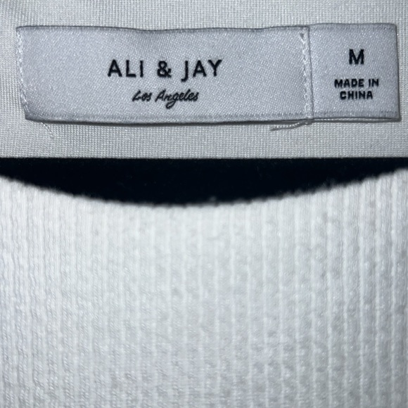 PO: Women’s White Ruffle bottom dress. - Picture 3 of 4